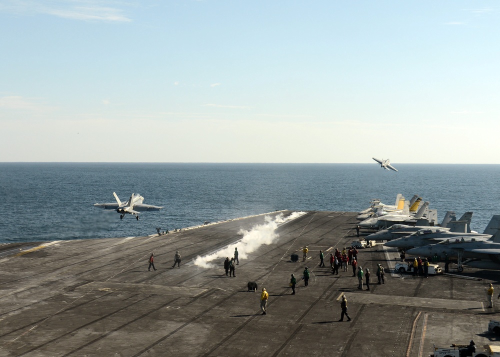 F/A-18E Super Hornets launch from USS Harry S. Truman