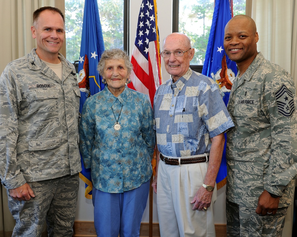 Retired Chief Master Sgt. of the Air Force James McCoy checks progress of 15th Wing