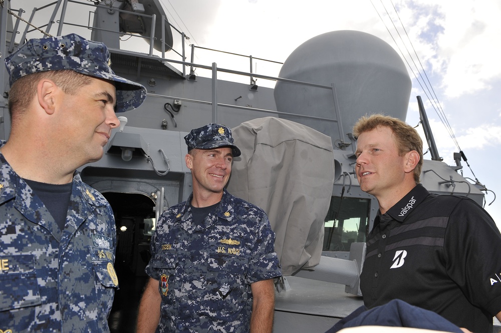 Professional golfer visits former ship