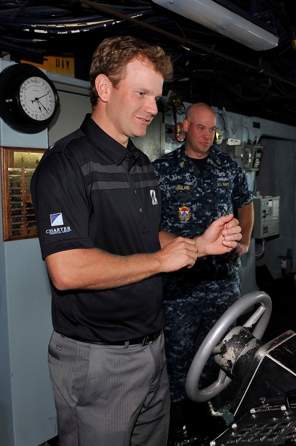 Professional golfer visits former ship