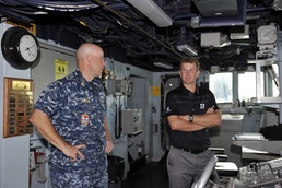 Professional golfer visits former ship