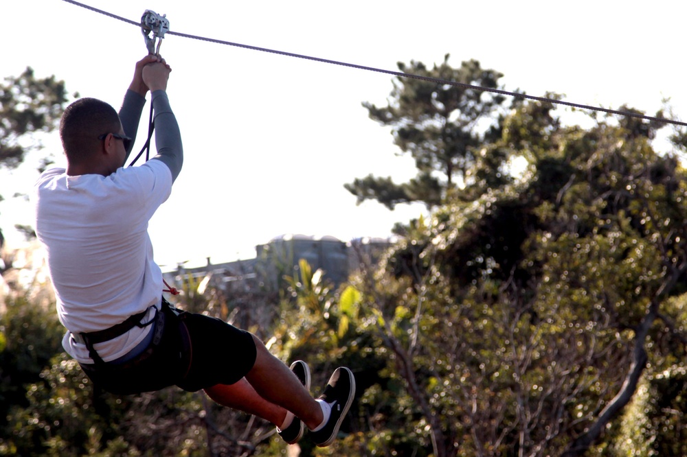 Marines zip-line through Okinawa’s jungle