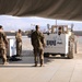 Family affair: Mom, sons sort equipment at retrosort yard in Afghanistan