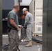 249th Engineer Battalion feeds cable through an access hole