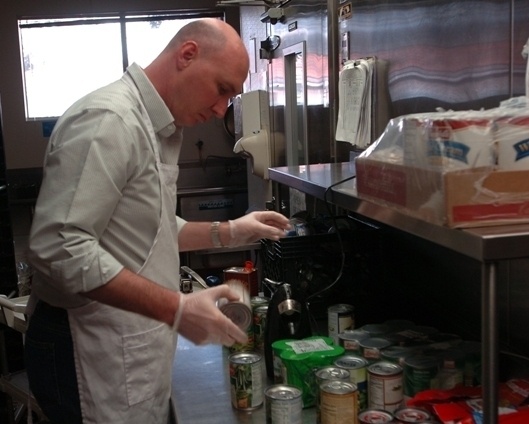 Soldiers lend helping hands at Open Heart Kitchen for those in need