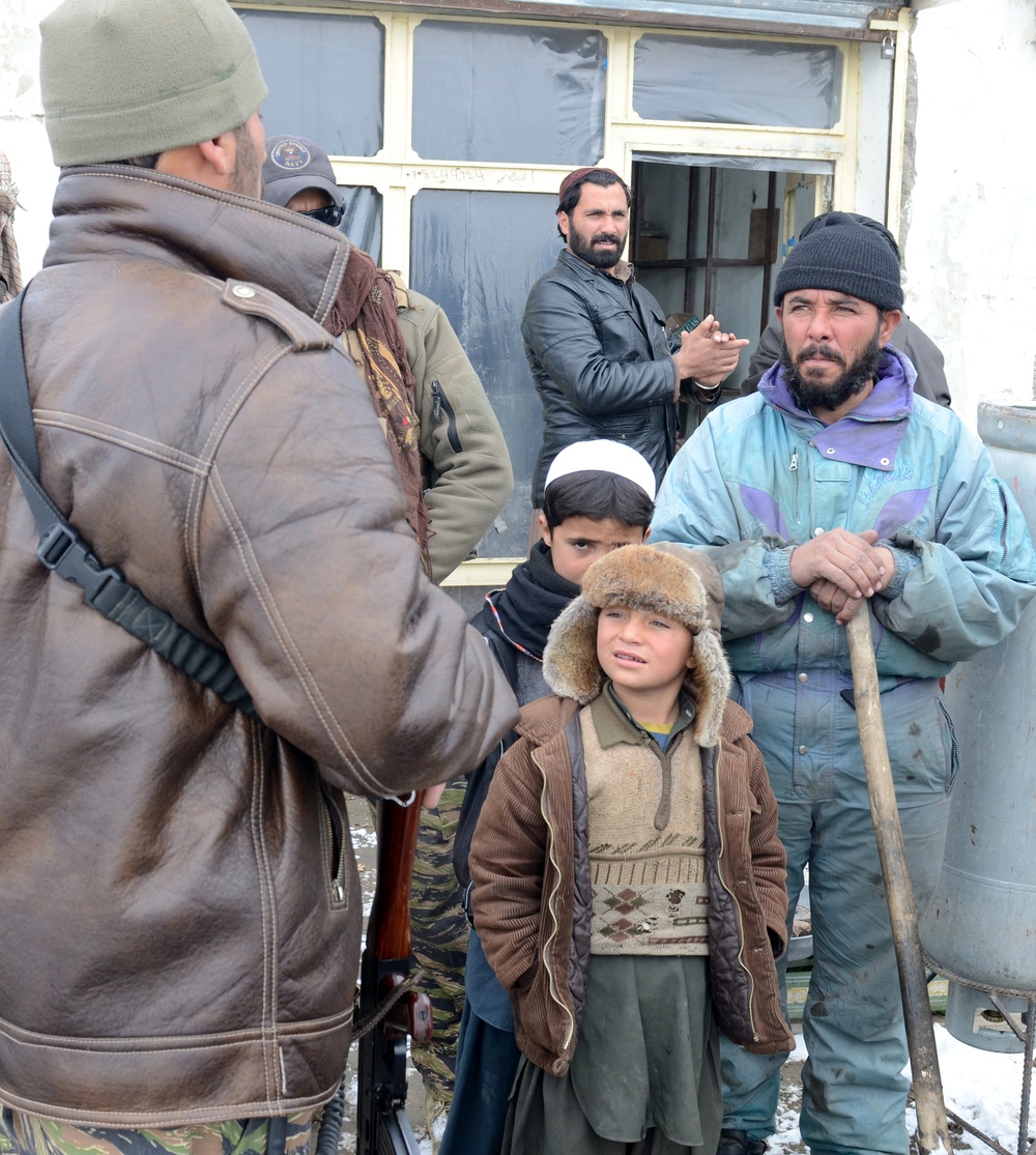 ANSF conduct presence patrol through Sharana