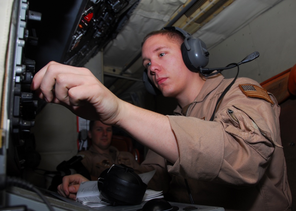 Aircrewman conducts pre-flight procedures