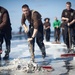 USS Harry S. Truman sailors scrub the flight deck