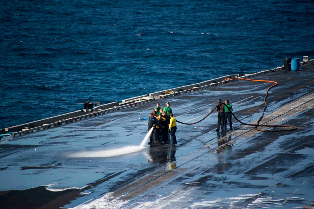 USS Harry S. Truman's flight deck scrubbed