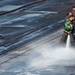 USS Harry S. Truman crew hoses flight deck