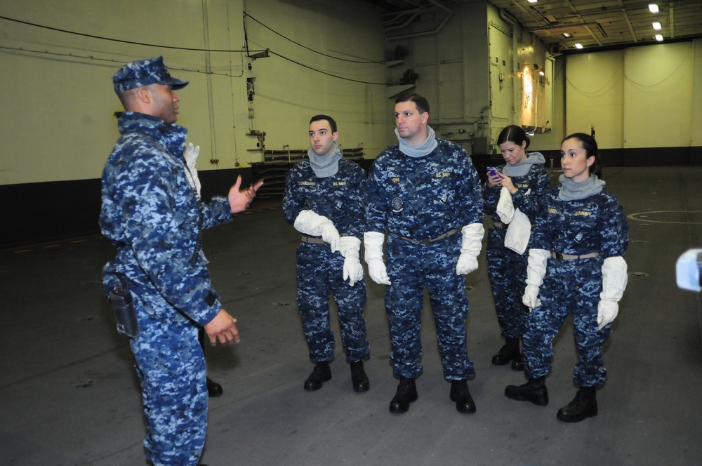 Junior officers tour USS Theodore Roosevelt