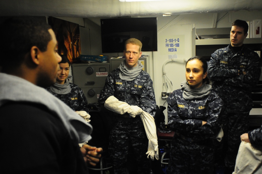 Junior officers tour USS Theodore Roosevelt
