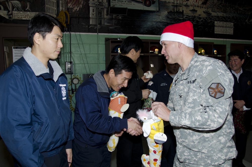 Santa Express delivers smiles, treats to Yongsan’s unsung heroes