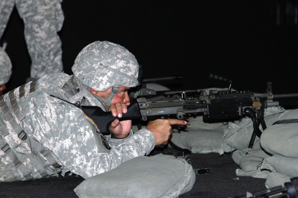 Sgt. Salvador engages engages target with M249