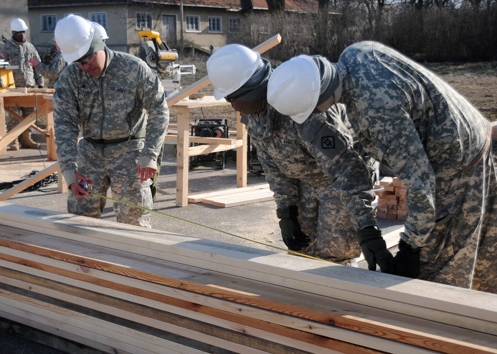 902nd Eng. Co. soldiers rapidly construct customs facility at MK