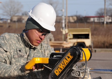 902nd Eng. Co. soldiers rapidly construct customs facility at MK