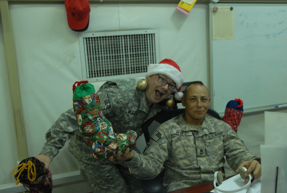 Soldiers with 371st Sus. Bde. receive Christmas joy in Kuwait