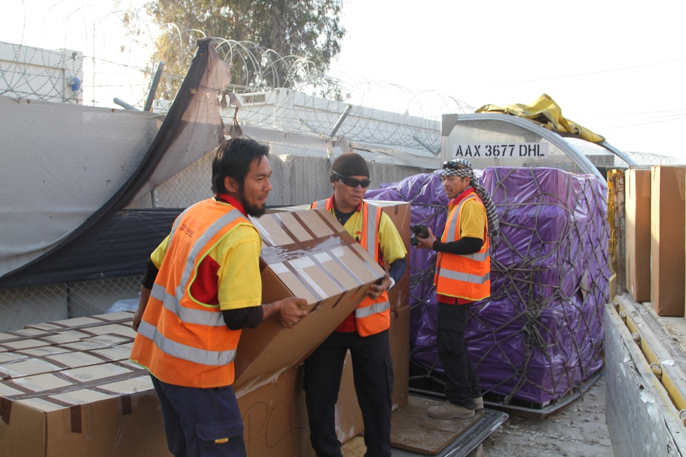Donated pizzas arrive at Kandahar Airfield