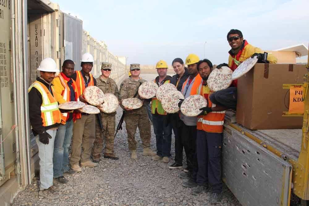 Donated pizzas arrive at Kandahar Airfield
