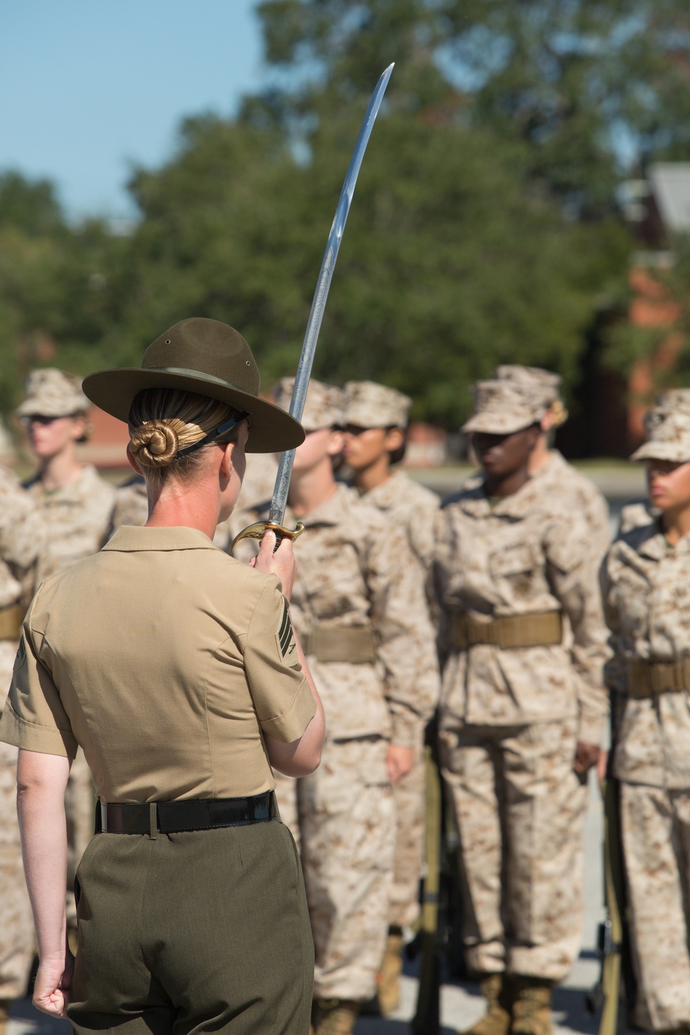 Marine recruits judged on discipline during a final drill evaluation on Parris Island