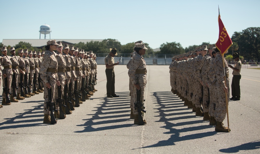 Marine recruits judged on discipline during a final drill evaluation on Parris Island