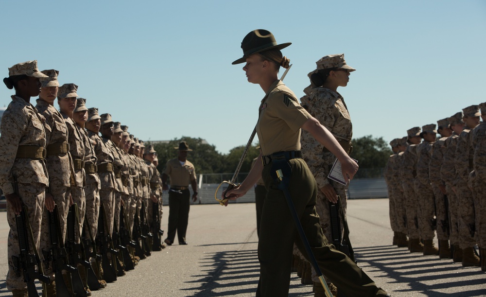 Marine recruits judged on discipline during a final drill evaluation on Parris Island