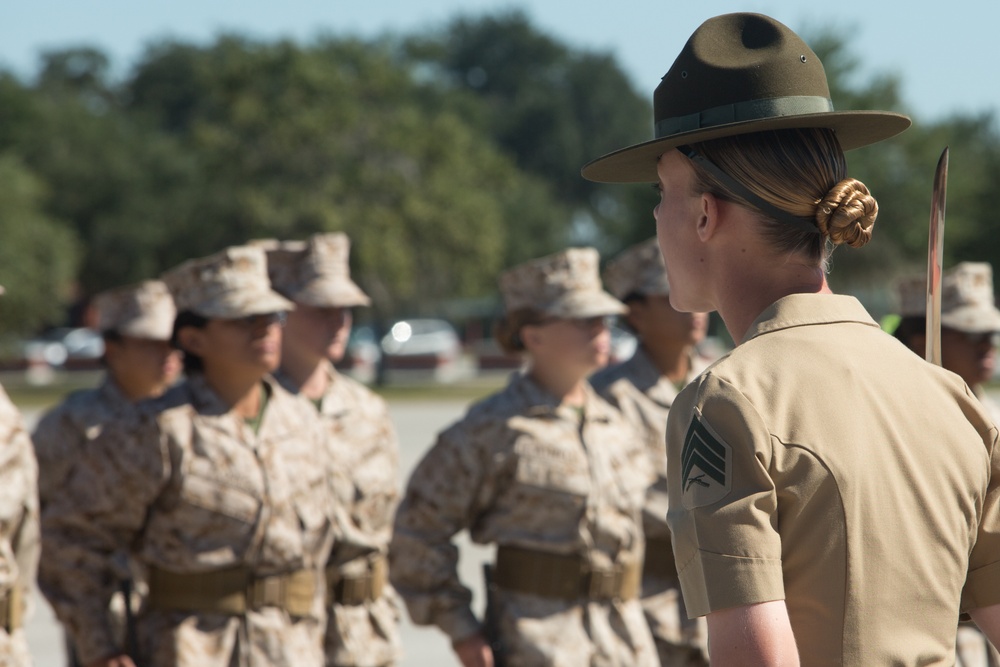 Marine recruits judged on discipline during a final drill evaluation on Parris Island