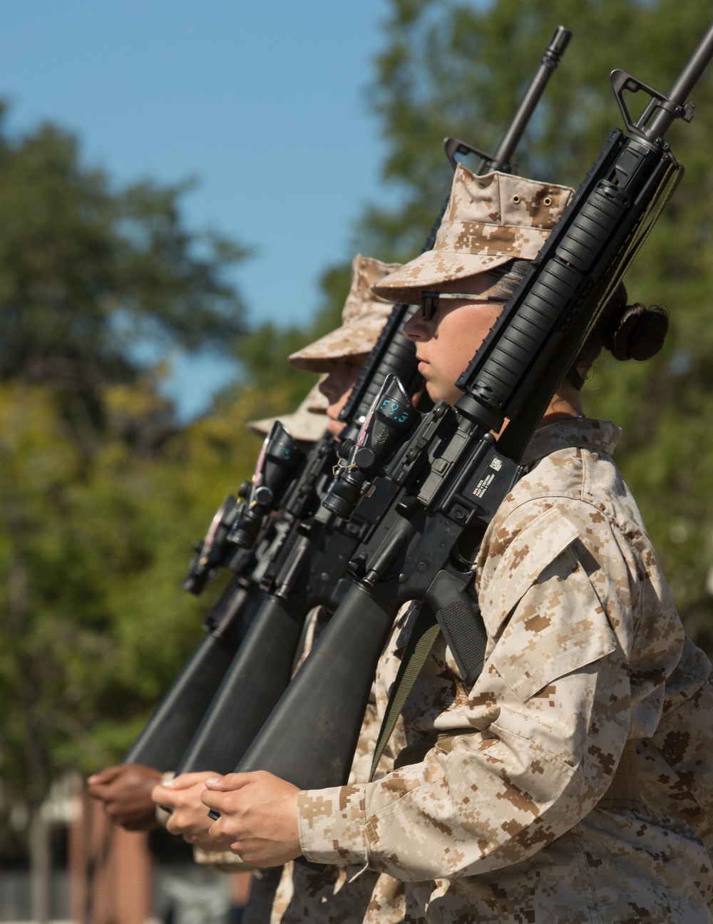 Marine recruits judged on discipline during a final drill evaluation on Parris Island