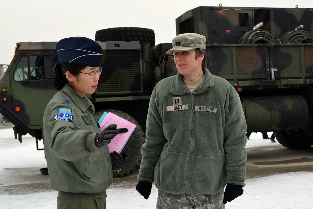 US Army air defense coordinator speaks with ROK officer