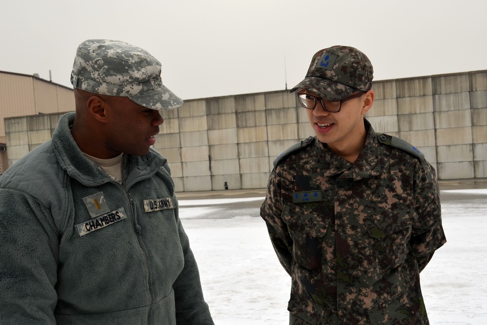 US Army officer speaks with ROK translator