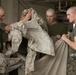 Marine recruits work together to help out around Parris Island