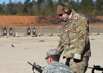 Soldiers fire SCAR heavy weapons