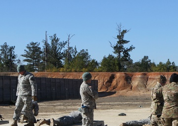 Soldiers fire SCAR heavy weapons