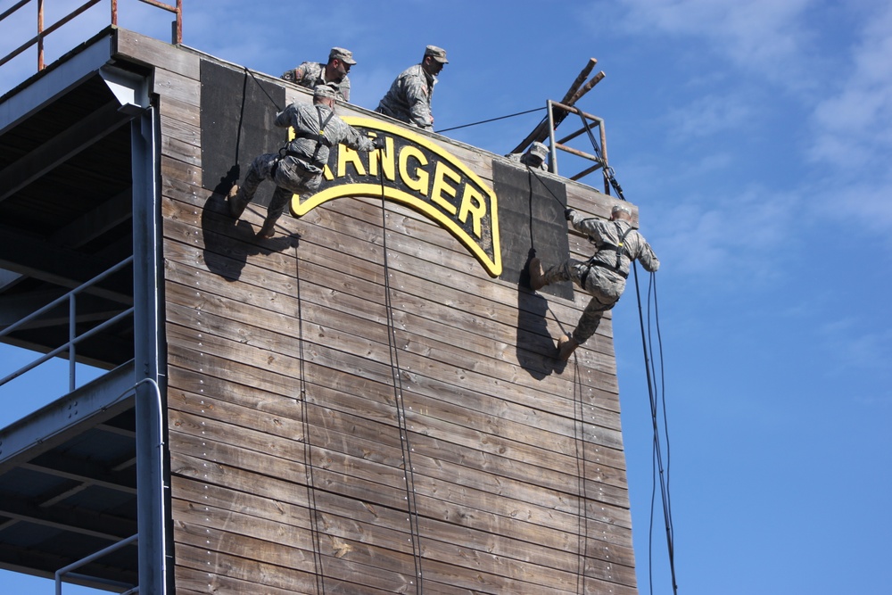 Ranger instructors demonstrate rappel off the tower