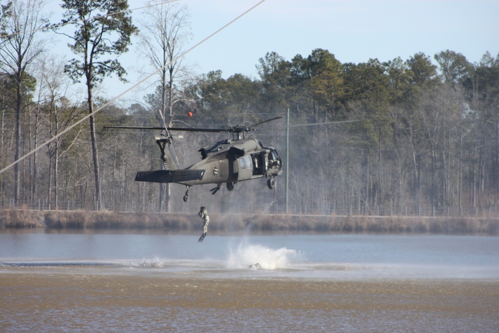 Instructors demonstrate water insertion from UH-60 Black Hawk during Ranger School graduation