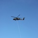 Instructors demonstrate SPIE extraction from UH-60 Black Hawk during Ranger School graduation