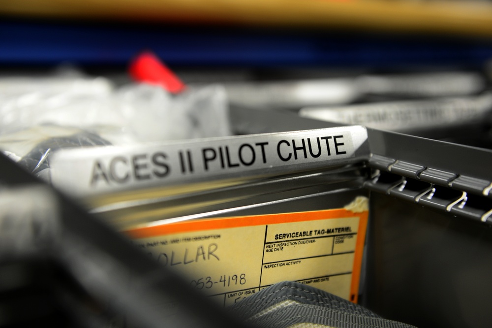 Airmen at the 182nd Flight Squadron repair, maintain, and repack parachutes