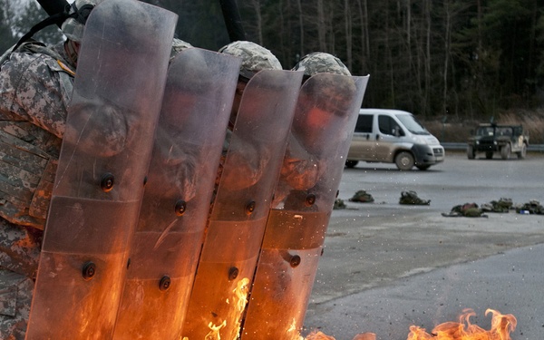 Multinational soldiers deal with riots, fire at JMRC