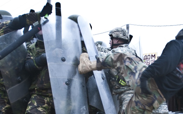 Multinational soldiers deal with riots, fire at JMRC