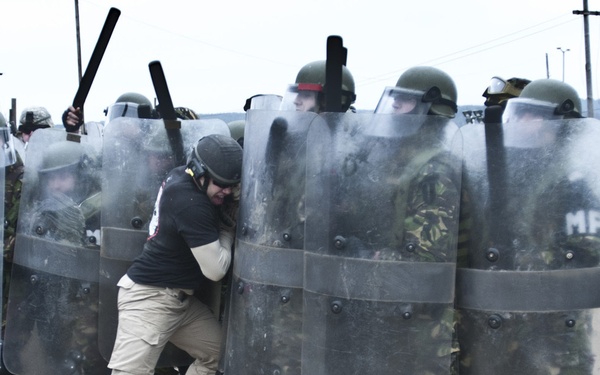 Multinational soldiers deal with riots, fire at JMRC