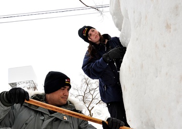 2014 Navy Misawa Snow Team commence work on snow sculpture
