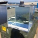 Underwater Construction Team ONE Dive Detachment Bravo performs underwater pier inspection utilizing a clear water box