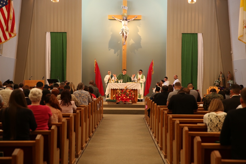 Archbishop conducts Mass at Combat Center