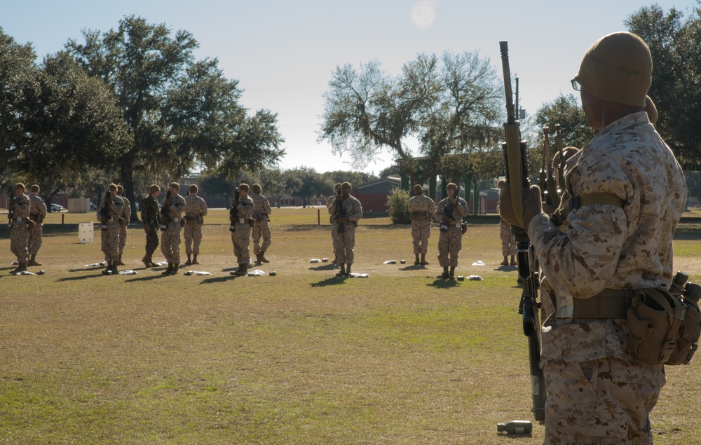 Parris Island primary marksmanship instructors train recruits to be basic Marine riflemen