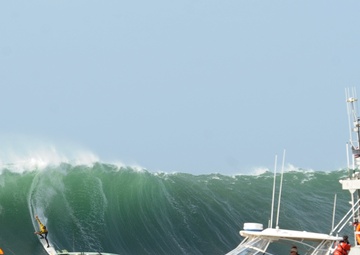 A Coast Guard Station Monterey motor lifeboat helps maintain safe vessel traffic at Mavericks
