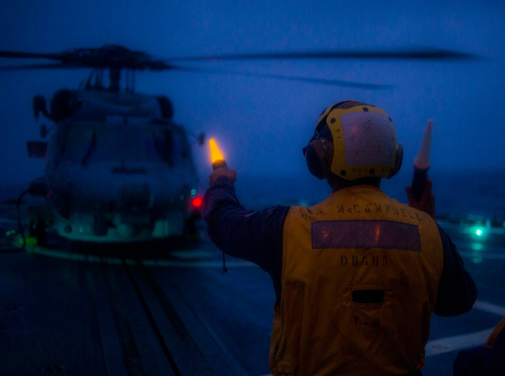 Conducting a drill aboard the USS McCampbell