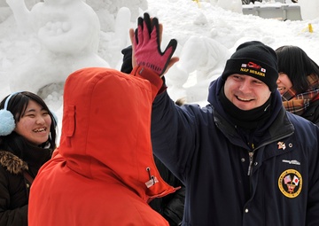 2014 Navy Misawa Snow Team completes 'Fighting Bee' snow sculpture
