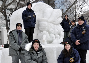 2014 Navy Misawa Snow Team completes 'Fighting Bee' snow sculpture