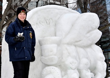 2014 Navy Misawa Snow Team completes 'Fighting Bee' snow sculpture