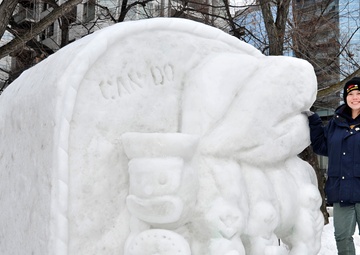 2014 Navy Misawa Snow Team completes 'Fighting Bee' snow sculpture